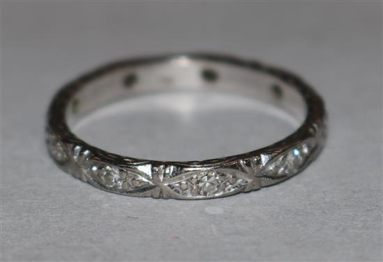 A platinum and diamond set eternity ring, size N.